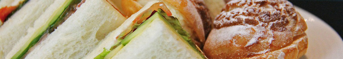 Eating Sandwich at Chicago Bagel Authority - Armitage restaurant in Chicago, IL.